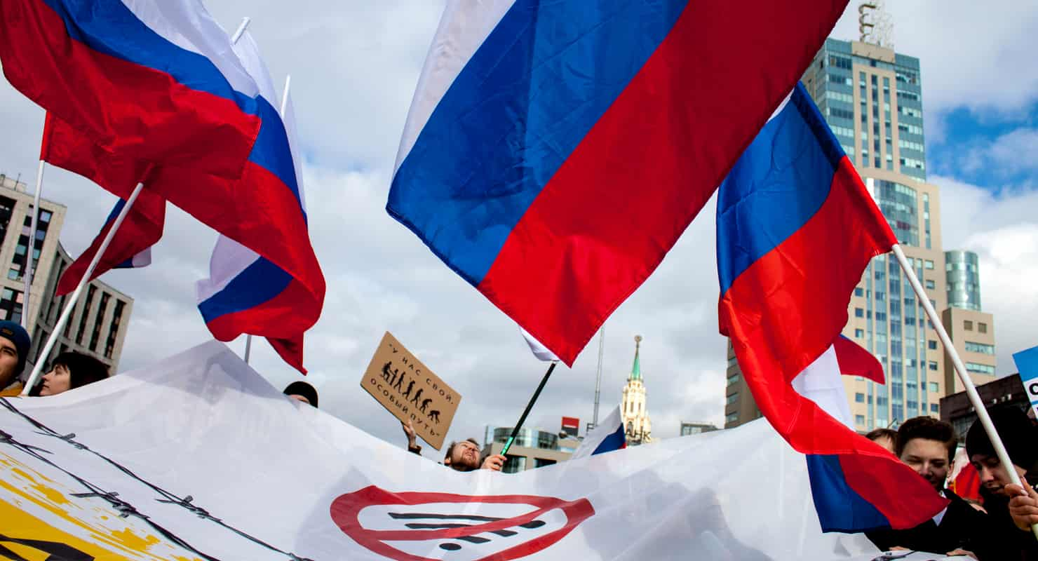 Russian VPN spending investigation header photo showing flags and a banner with a crossed-out WiFi symbol